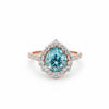 GEMHUB 4.70 Ct pear cut blue moissanite solitaire ring with halo, set in gold vermeil over sterling silver.