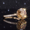 GEMHUB 10.50 Ct round cut champagne moissanite ring with pavé band in gold vermeil.