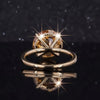 GEMHUB 10.50 Ct round cut champagne moissanite ring in gold vermeil with pavé band.