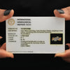 18k yellow gold criss-cross ring shown alongside IGI certificate card