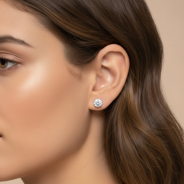GEMHUB 1 Ct round lab-created diamond stud earrings in 950 platinum with screw backs.