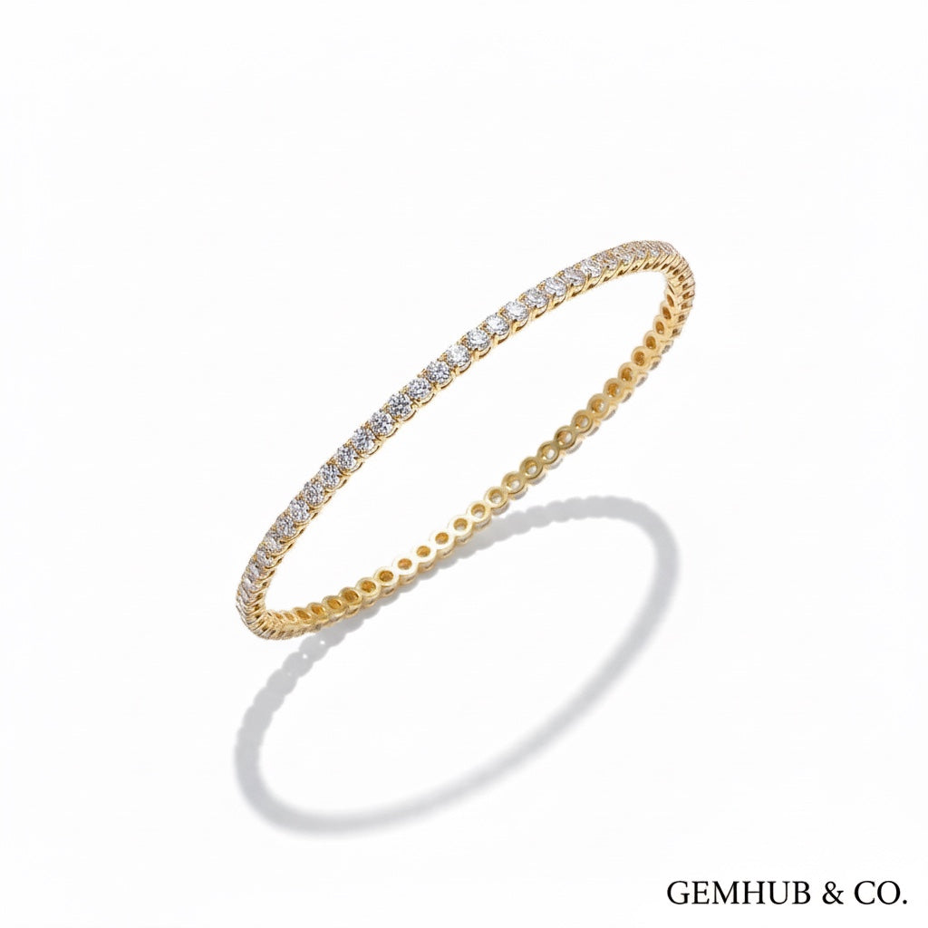 14k yellow gold tennis bracelet with 3.80 carats of round natural diamonds