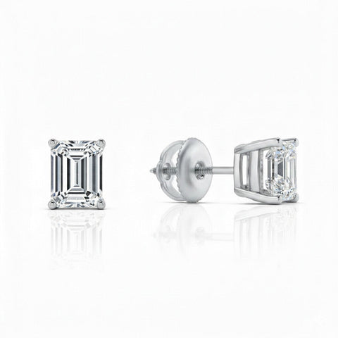 GEMHUB Emerald cut 1 Ct F/VS lab-created diamond stud earrings in 950 platinum with screw backs.