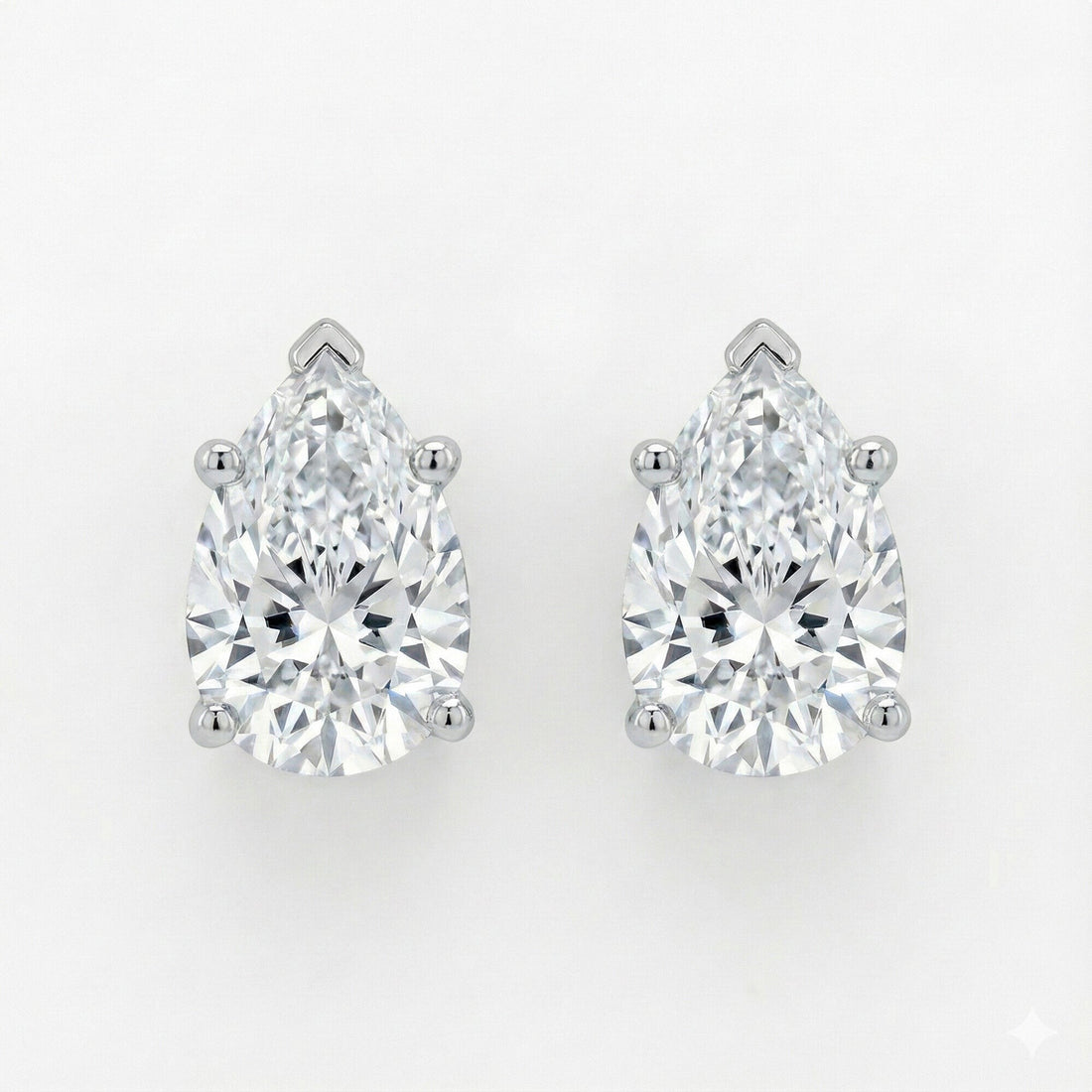 GEMHUB Pear-shaped lab-created diamond stud earrings in 950 platinum with screw backs, 2 ct total weight.