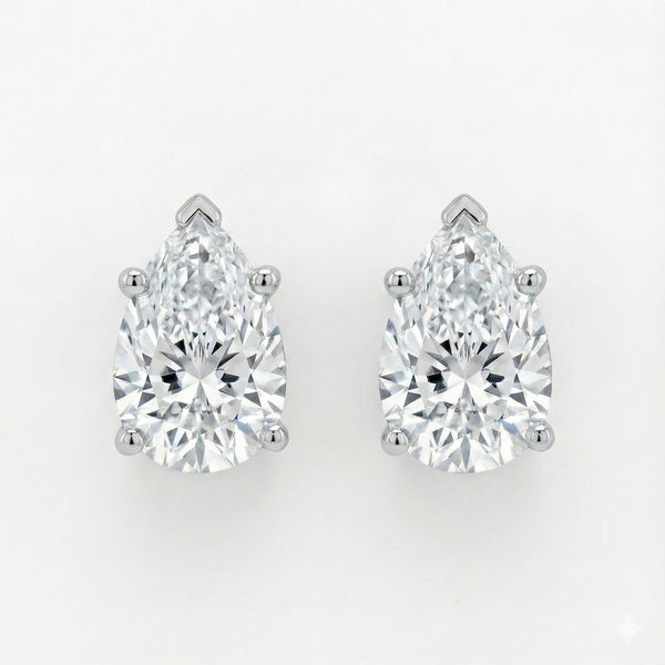 GEMHUB Pear-shaped lab-created diamond stud earrings in 950 platinum, 1 Ct total weight, F/VS clarity, screw back closure.
