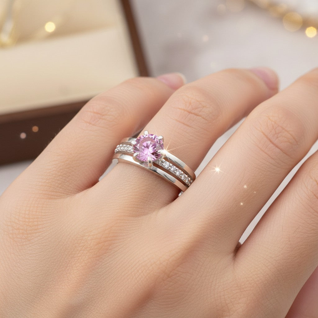 GEMHUB 18K gold plated vermeil ring with a 1.35ct round pink moissanite center stone and channel-set accent stones.
