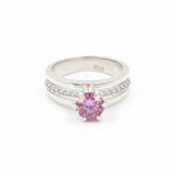 GEMHUB 18K gold plated vermeil ring with a 1.35ct round pink moissanite center stone and pav0e9 set accent stones.
