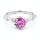 GEMHUB 1.3ct pink moissanite solitaire ring in 18K gold plated vermeil over sterling silver with accent stones.