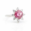 GEMHUB 2.5ct pink moissanite solitaire ring with surrounding white accent stones, set in 18K gold plated vermeil.