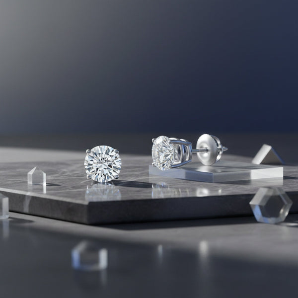 GEMHUB 1 Ct round lab-created diamond stud earrings in 950 platinum with screw backs. IGI certified.