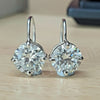 GEMHUB 5.00 Ct white moissanite solitaire dangler earrings in gold vermeil with round cut.