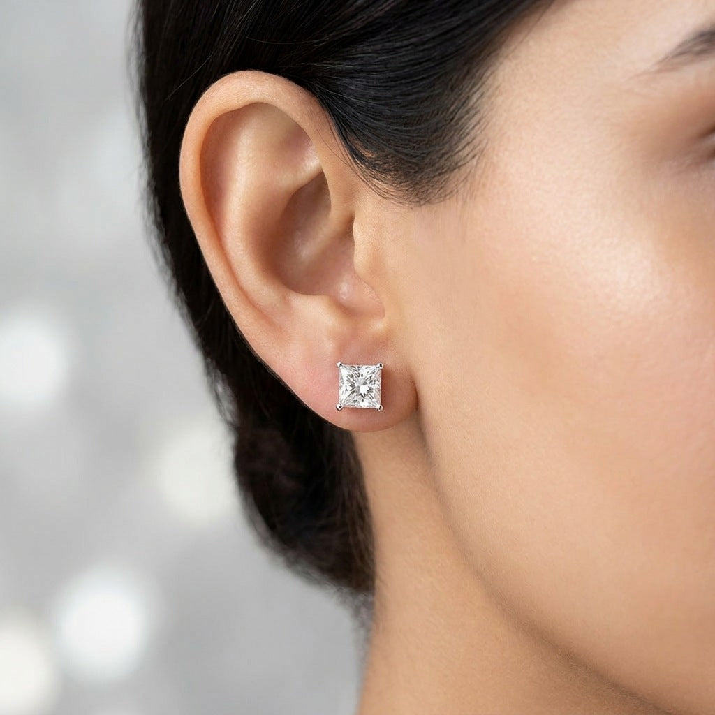 Close-up of the princess cut stud on the earlobe
