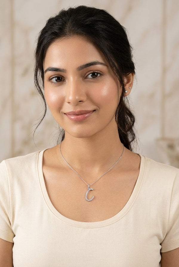 GEMHUB model wearing initial C pendant
