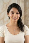 GEMHUB model wearing initial G pendant