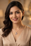 GEMHUB model wearing initial H pendant