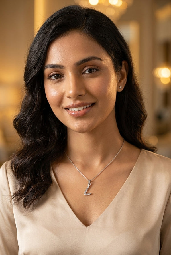 GEMHUB model wearing initial L pendant