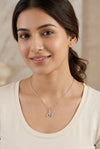 GEMHUB model wearing initial M pendant