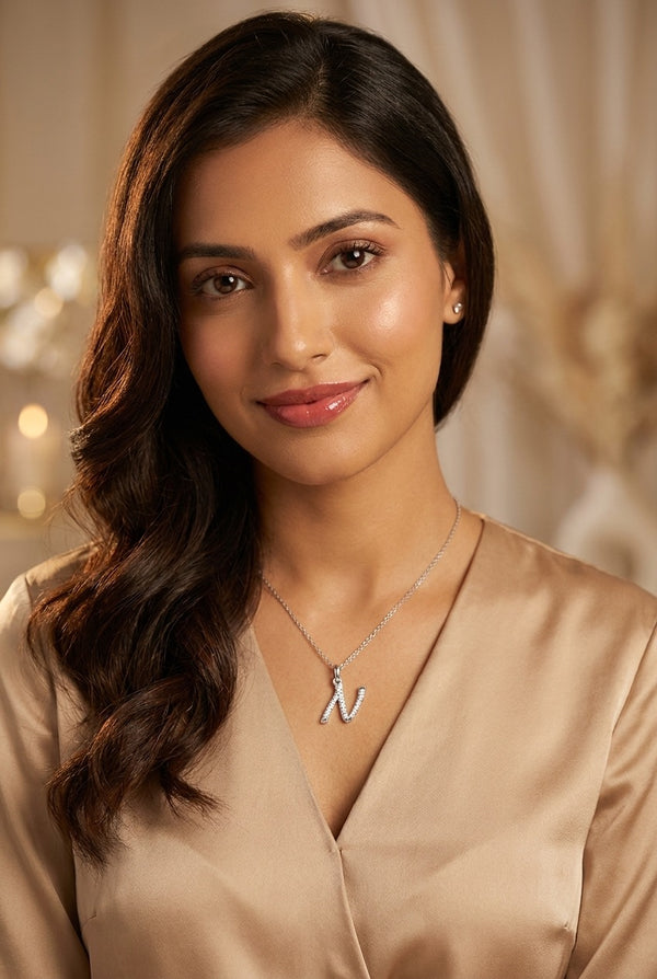 GEMHUB model wearing initial N pendant