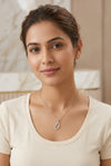 GEMHUB model wearing initial Q pendant