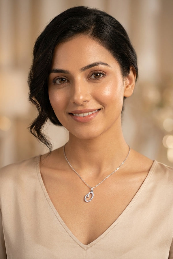 GEMHUB model wearing initial Q pendant