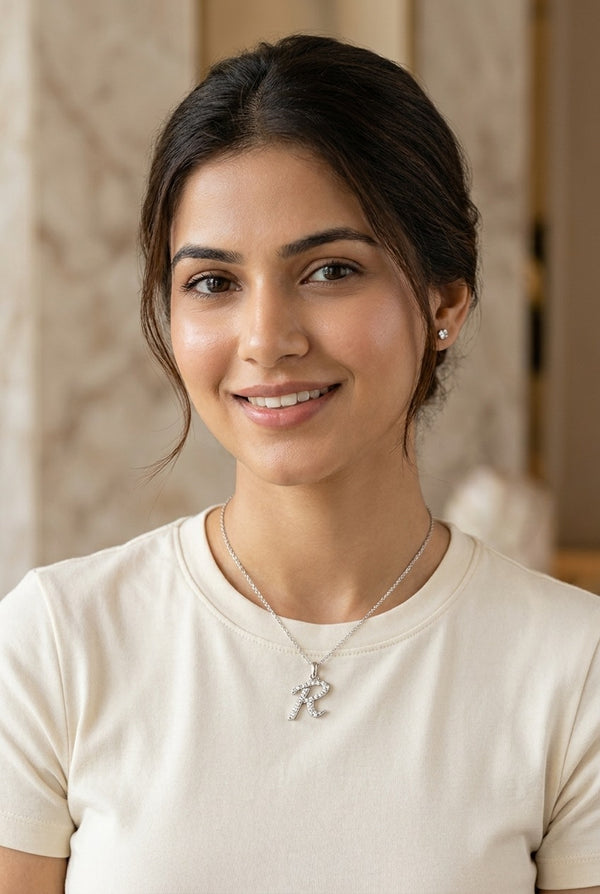 GEMHUB model wearing initial R pendant