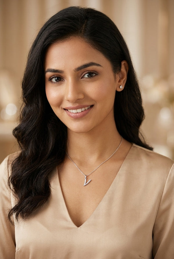 GEMHUB model wearing initial V pendant