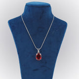 GEMHUB Red Topaz Oval 94.5 Ct lab-grown gemstone pendant on display bust (AI render)