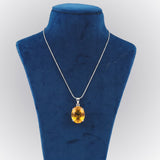 GEMHUB Yellow Citrine Oval 65 Ct lab-grown gemstone pendant on display bust (AI render)