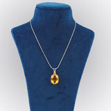 GEMHUB Yellow Citrine Oval 80 Ct lab-grown gemstone pendant on display bust (AI render)
